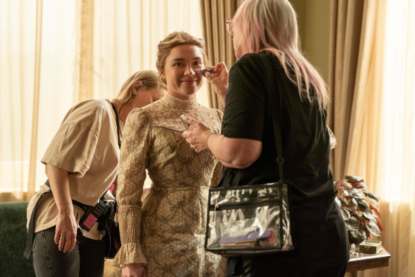 Makeup artist Heba Thorisdottir and hairstylist Jaime Leigh McIntosh touchup Florence Pugh on set of Netflix's East of Eden.